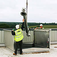 equipment access hatch being used to transfer large equipment to and from building via the roof