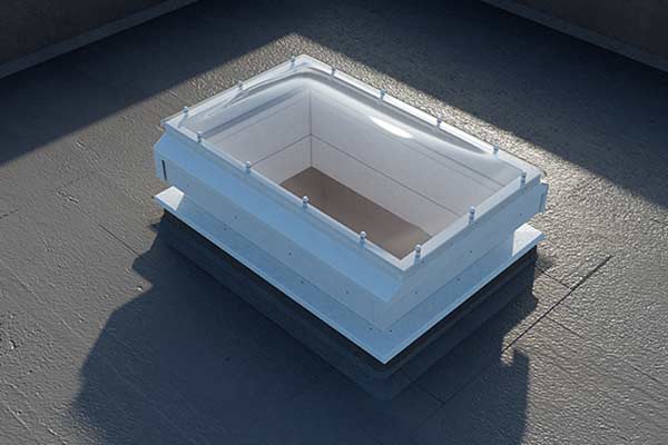 sliding skylight roof access hatch on flat roof in closed position